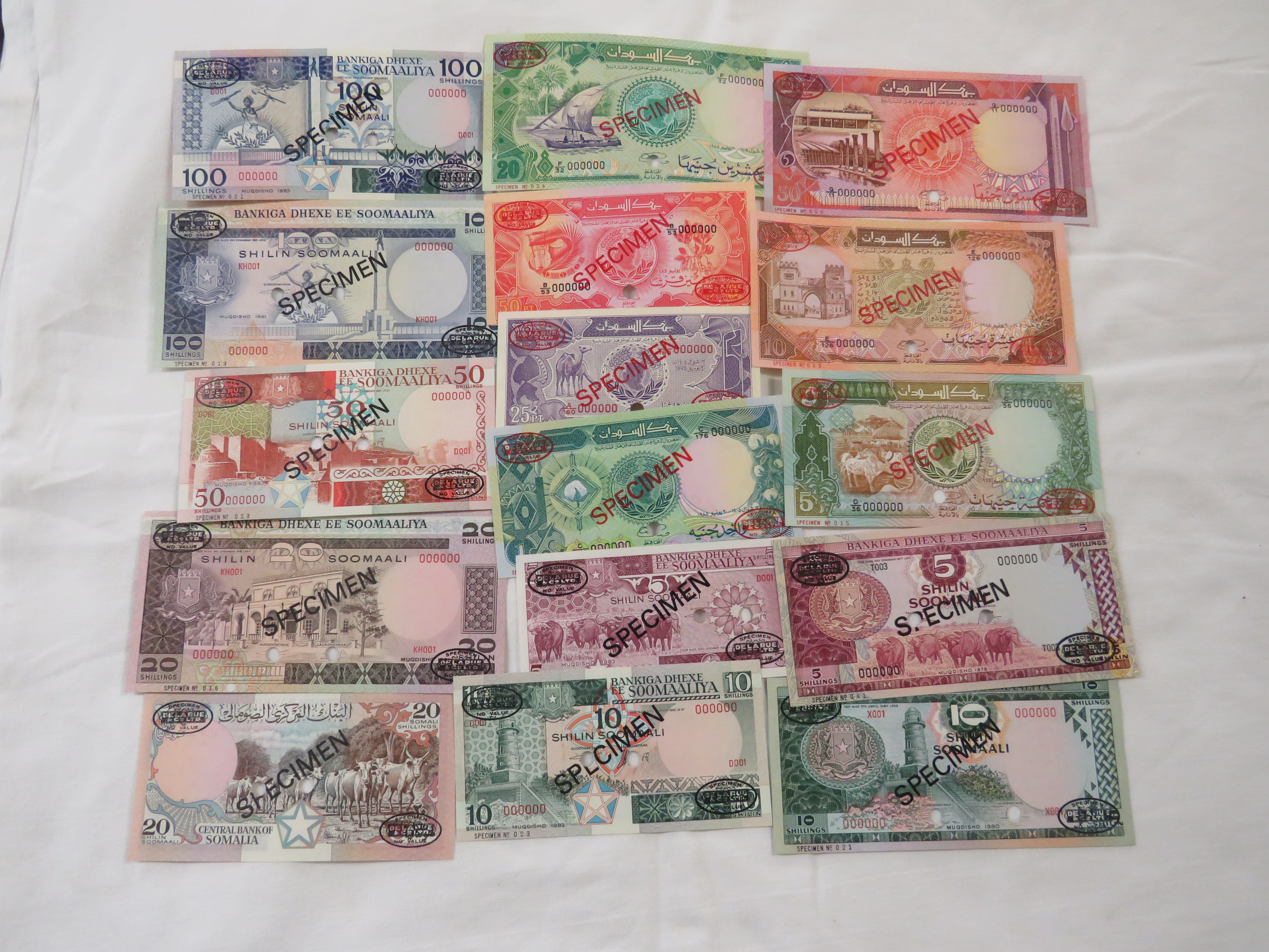 Seven specimen bank notes of Somalia over stamped 'Specimen De La Rue & Co' - two 100 shillings, - Image 2 of 2