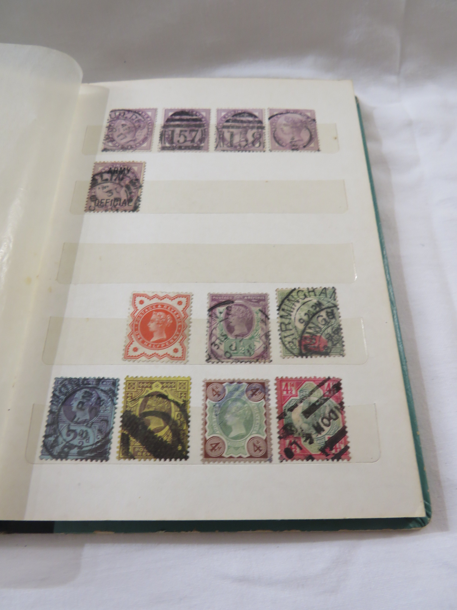 A green pocket album of Victorian and other stamps - Image 2 of 5