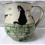 Royal Doulton H Souter jug decorated with four black and white cats on a wall grown with ivy and