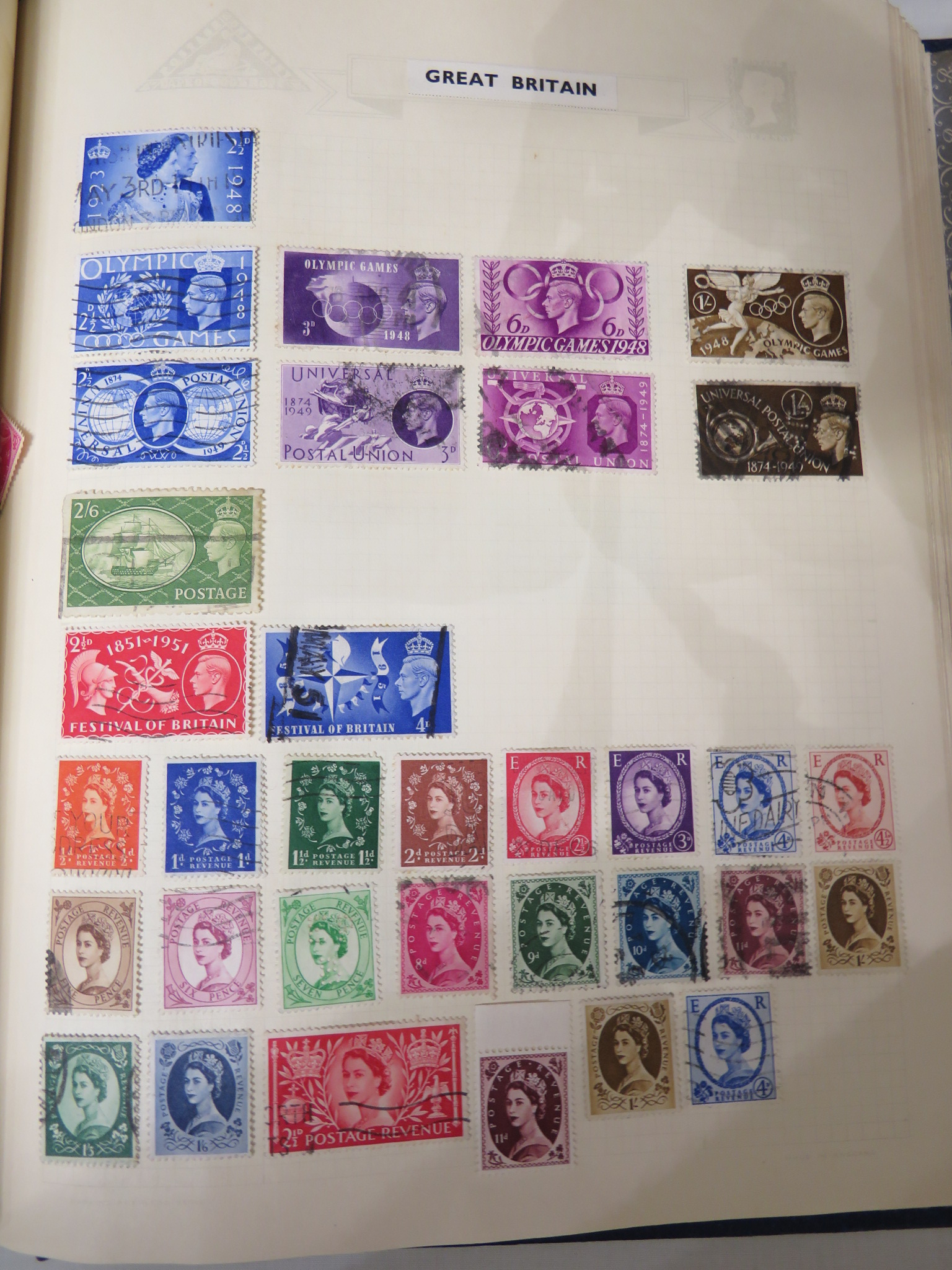 A red Tower stamp album containing early Canadian, New Zealand, Irish Free State over stamped - Image 4 of 4