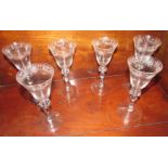 Six goblets with conical bowls etched towards the mouth with a border of geometric lines and