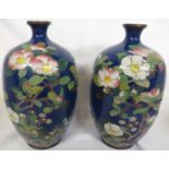 Pair of cloisonne ovoid vases, dark blue ground with flowers and flowering branches, height 18.