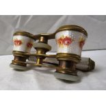 Pair of white guilloche enamel and gilt brass opera glasses with extending handle, transfer