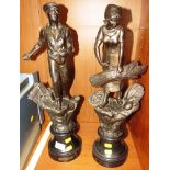 PAIR OF BRONZE EFFECT SPELTER FIGURES OF AGRICULTURAL PRACTICES