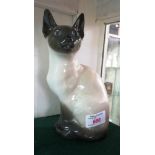 AMENDMENT TO CATALOGUERoyal Copenhagen porcelain figure of a seated Siamese cat, numbered 3281 (