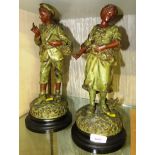 PAIR OF COLD PAINTED SPELTER FIGURES, ONE OF GIRL FEEDING BIRDS, ONE OF BOY WITH SATCHEL AND BOOK,