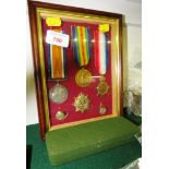 GLAZED PRESENTATION CASE OF FIRST WORLD WAR MEDALS MADE OUT TO PRIVATE 'W. J. STEVENS' INCLUDING