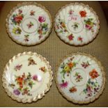 FOUR DRESDEN PORCELAIN SAUCERS WITH GILT DECORATION AND HAND PAINTED FLOWERS (A/F)