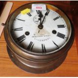 BRASS CASED PORTHOLE STYLE WALL CLOCK WITH ENAMEL FACE (A/F - MAKER INDISTINCT 54 OLD HALL STREET
