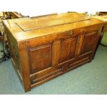 A late 18th / early 19th century large oak three panel coffer with replacement hinges, brass