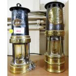 TWO BRASS AND CAST METAL MINER'S LAMPS