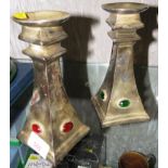 PAIR OF SILVER PLATED ARTS AND CRAFT STYLE CANDLESTICKS WITH INSET MELTED GLASS STONE