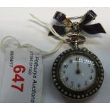 FOREIGN SILVER AND ENAMEL LADIES FOB WATCH INSET WITH SEED PEARLS AND WITH GILDED DETAILING,