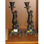 PAIR OF CAST METAL BRONZE EFFECT FIGURAL CANDLESTICKS (A/F)