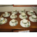 ROYAL WORCESTER TEA CUPS AND COFFEE CUPS AND SAUCERS (FIVE OF EACH) WITH BAMBOO MOULDED HANDLES