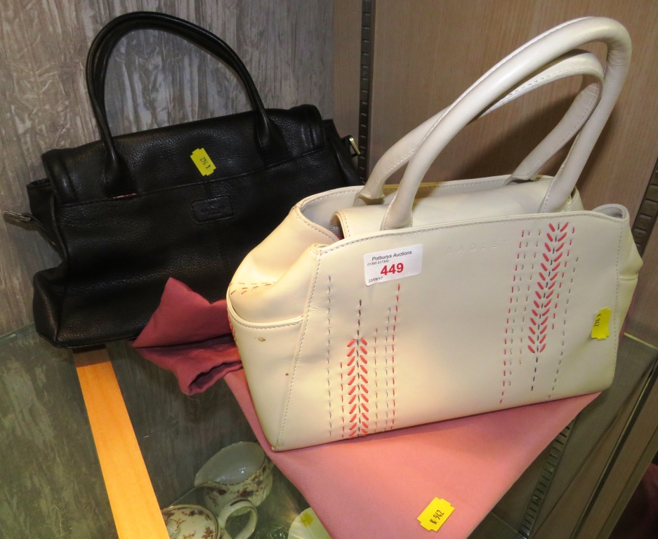 TWO LADIES RADLEY HANDBAGS, ONE IN CREAM LEATHER WITH COLOURED STITCHING, ONE IN BLACK LEATHER, WITH