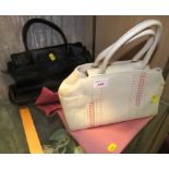 TWO LADIES RADLEY HANDBAGS, ONE IN CREAM LEATHER WITH COLOURED STITCHING, ONE IN BLACK LEATHER, WITH