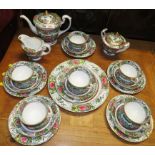 PART CHINA TEA SERVICE DECORATED IN ORIENTAL FLORAL PATTERN INCLUDING TEAPOT, JUG AND LIDDED SUGAR