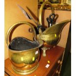 TWO BRASS COAL SCUTTLES, ONE WITH PAW FEET, TOGETHER WITH SELECTION OF FIRESIDE TOOLS