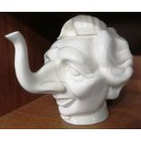 WHITE GLAZED CERAMIC FIGURAL TEAPOT DEPICTING MARGARET THATCHER, MARKED LUCK AND FLAW C 1980