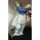 NAO FIGURE OF GIRL WITH CAKE AND PUPPY