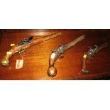 THREE ORNAMENTAL REPLICA FLINTLOCK PISTOLS