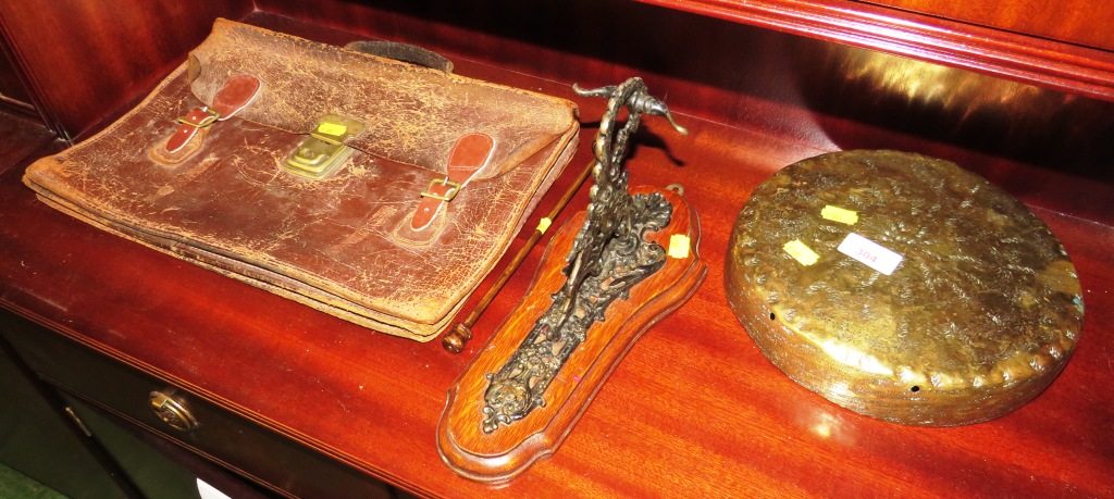 BRASS GONG WITH MOUNTED WALL BRACKET TOGETHER WITH LEATHER SATCHEL