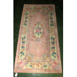 SMALL RECTANGULAR PINK GROUND FLORAL PATTERN EMBOSSED FLOOR RUG