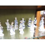 SIXTEEN MODERN BLUE AND WHITE CHINA FIGURINES