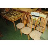 ERCOL LIGHT ELM EXTENDING DINING TABLE WITH FOLDING LEAF STANDING ON TAPERED LEGS AND EIGHT