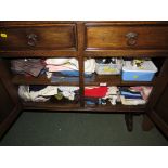CUPBOARD OF SEWING AND NEEDLEWORK ITEMS INCLUDING FABRIC, THREAD, ETC