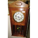 OAK CASED CHIMING WALL CLOCK WITH WINDING KEY