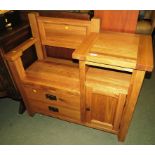 LIGHT OAK TELEPHONE TABLE WITH SINGLE DRAWER BENEATH SEAT AND RECESS AND SINGLE DOOR TO SIDE