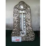 SILVER MOUNTED DESK THERMOMETER WITH REPOUSSE FOLIAGE, LONDON ASSAY (A/F)