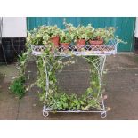 CREAM PAINTED METAL CONSERVATORY PLANT STAND ON LEGS WITH CONTENTS