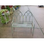 GREEN PAINTED GOTHIC STYLE METAL GARDEN BENCH WITH TWIN ARCH SHAPED BACK