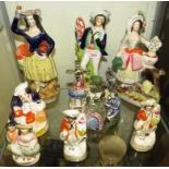 EIGHT STAFFORDSHIRE POTTERY FIGURES OF VARIOUS SIZES, INCLUDING SAILOR AND PEN HOLDER MODELLED AS