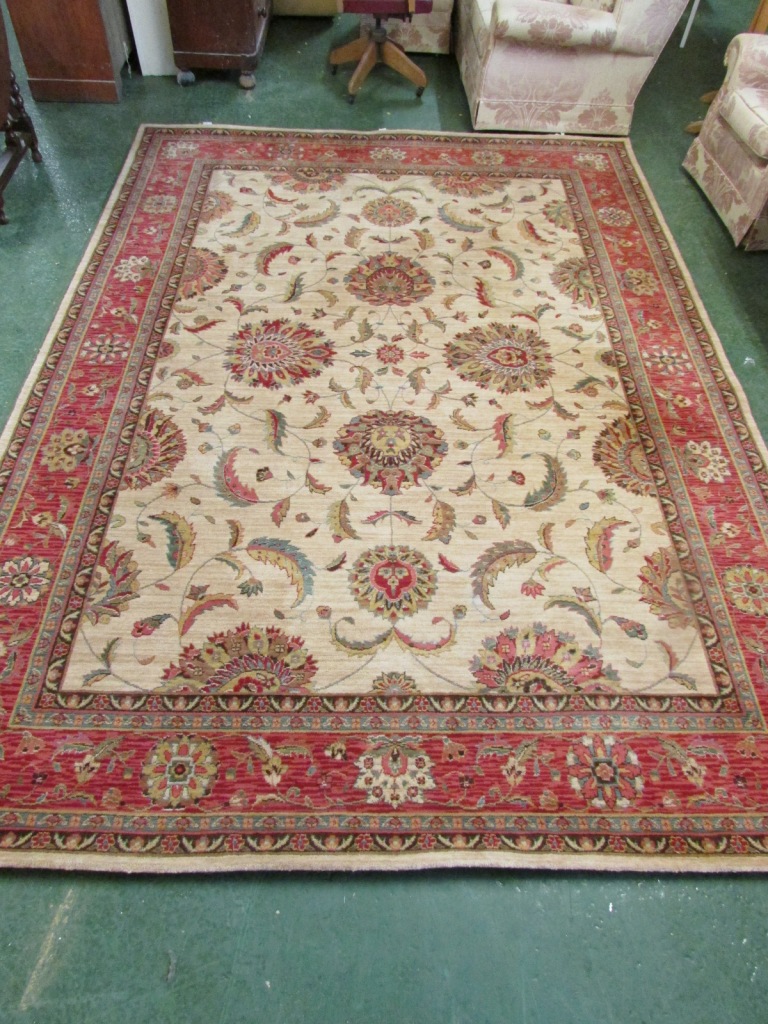 NOURISON LIVING TREASURES COLLECTION RUG, BEIGE GROUND WITH RED BORDERS AND FOLIATE PATTERNING