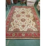 NOURISON LIVING TREASURES COLLECTION RUG, BEIGE GROUND WITH RED BORDERS AND FOLIATE PATTERNING