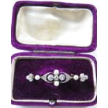**Payment in person or by bank transfer only**Diamond and pearl bar brooch, set with four seed