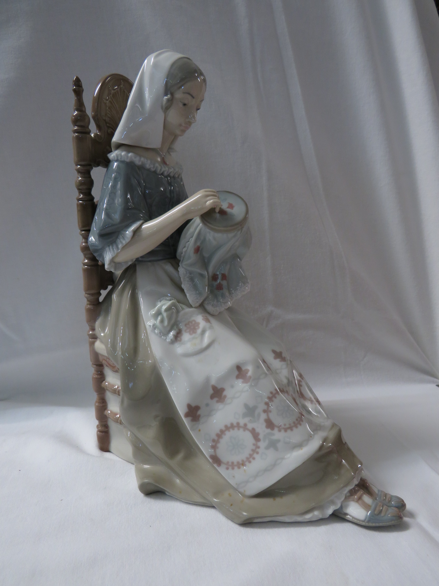 Lladro porcelain figure of a woman with embroidery seated on a spindle turned chair (height 28cm) - Image 2 of 4