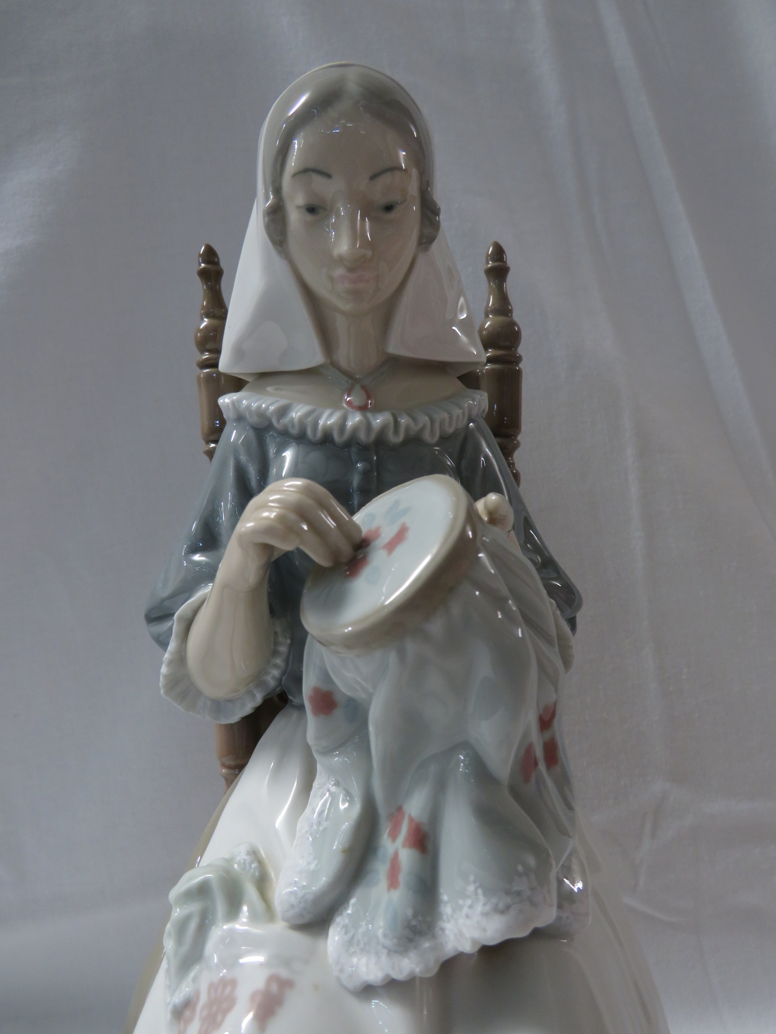 Lladro porcelain figure of a woman with embroidery seated on a spindle turned chair (height 28cm) - Image 3 of 4