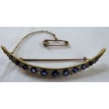 **Payment in person or by bank transfer only**A sapphire and diamond crescent brooch, eleven round