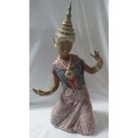 A Lladro stoneware figure of a kneeling Balinese dancer (height 43cm)