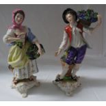 A matched pair of Rudolf Kammer porcelain figures of grape pickers, man and woman, each on