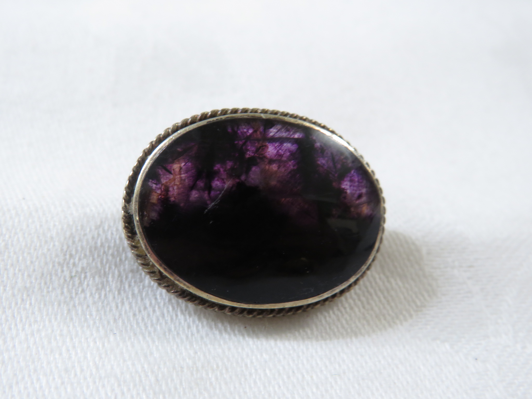 Two brooches - an oval amethyst brooch set within a halo of chip diamonds (overall 20mm x 16mm), and - Image 2 of 4