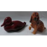 Doulton Flambe model of a duck (length 8cm), and a Doulton model of a seated brown spaniel with