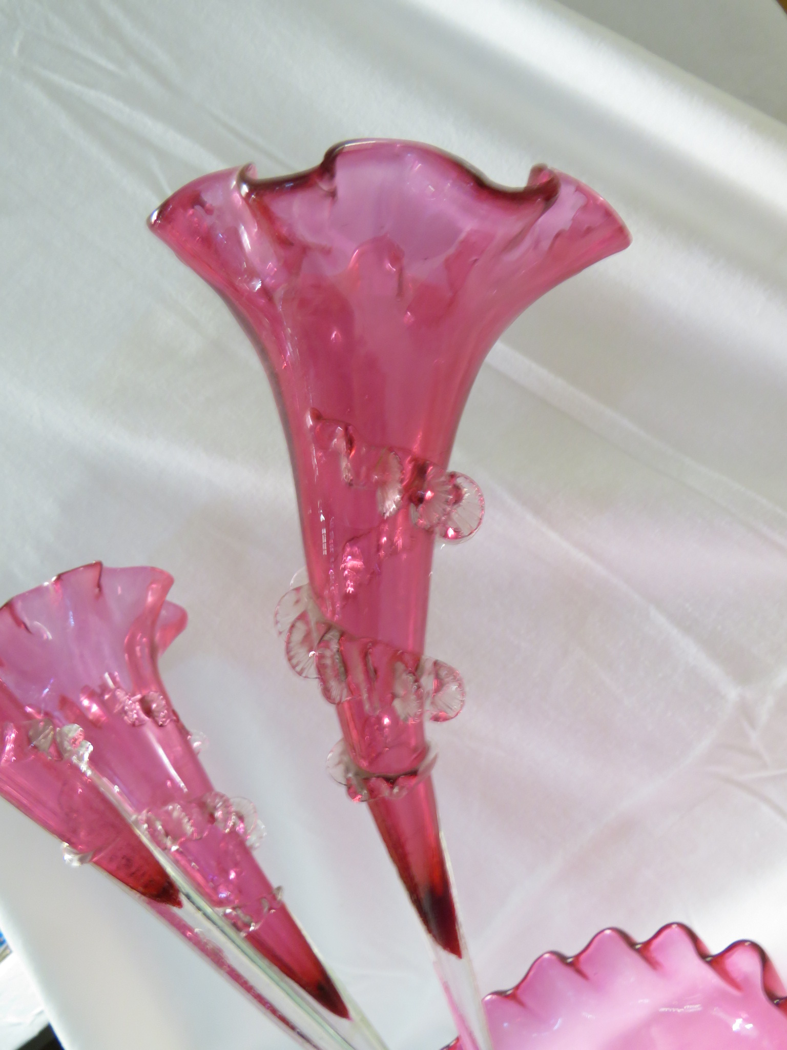 A fine Victorian fluted four stem cranberry glass epergne surmounted on a glass bowl. The trumpet - Image 4 of 5