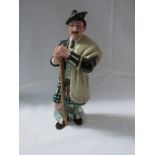 Two Royal Doulton figures - The Laird HN2361 and The Piper HN 3444 (one of the pipes on his bagpipes