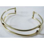 Yellow metal double wire bangle stamped 14K, (14.4g)